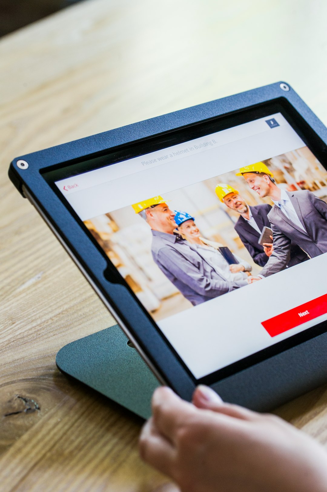 ipad-with-four-business-persons-shaking-hands-display-7dlprgsg8e4